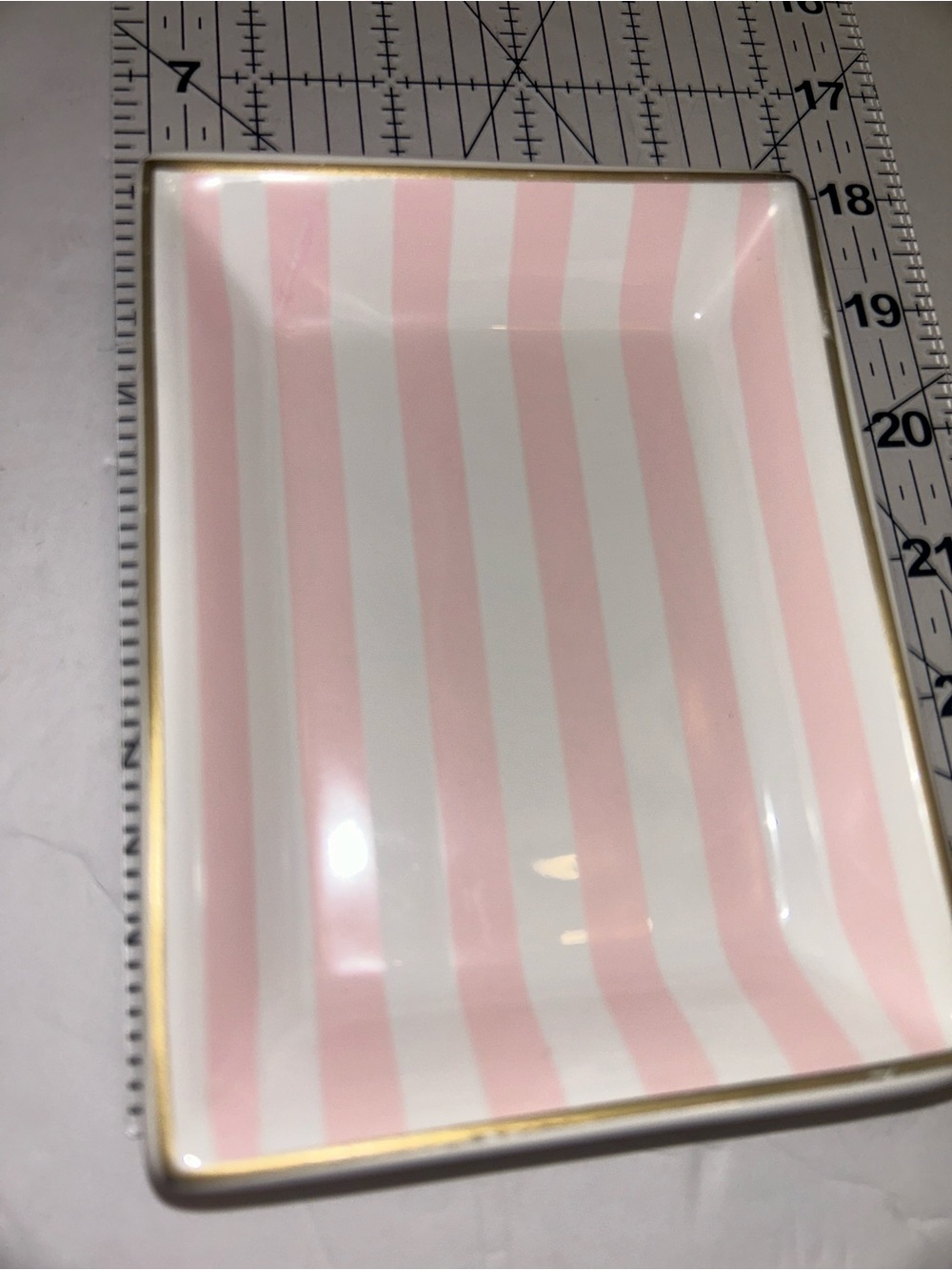 Victoria's Secret ceramic vanity tray featuring iconic pink and white stripes
